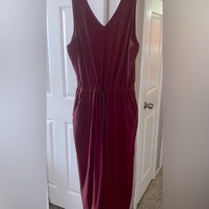 Very thick sleeveless jumpsuit. Never worn, adjustable drawstring.